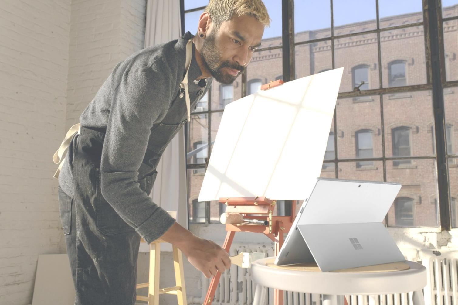 Professional trading environment with multiple monitors displaying market data and charts